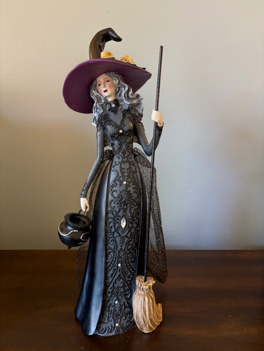 Elegant Black Witch Figurine with Purple Hat - Home Accents